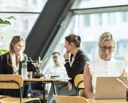 People sitting in a dining area.